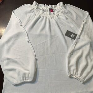 Vince Camuto Size XL NWT beautiful white peekaboo long sleeved blouse.